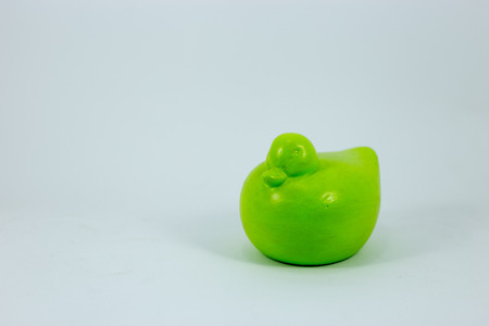 wooden toy duck with white backgroundの写真素材