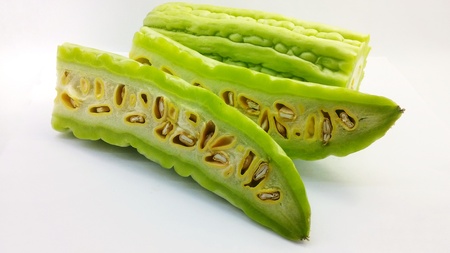 Half Bitter melon on white backgroundの写真素材