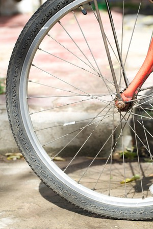 Part of Bicycle wheel with a stripe down the center