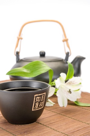 Asian teapot and cup close-upの写真素材