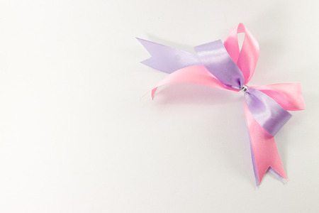 ribbon with a bow on a white backgroundの写真素材