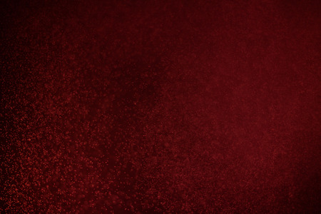 abstract dark bokhe lights background , red ,black and subtle gold. defocused backgroundの写真素材