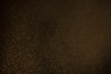 abstract dark bokhe lights background , purple,black and subtle gold. defocused backgroundの写真素材