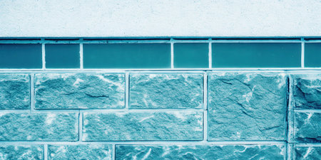 Blue and green mosaic tiles in swimming pool backgroundの素材