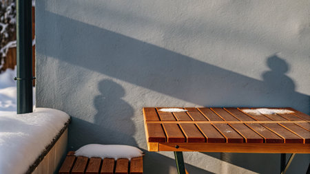 Shadow of a bench on a sunny patio.の素材