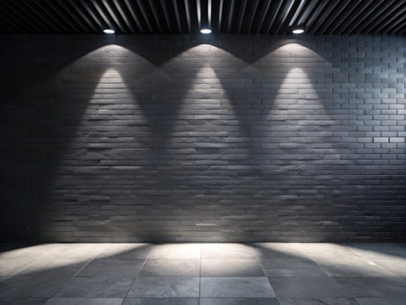 Empty room with brick wall and spotlights.の素材