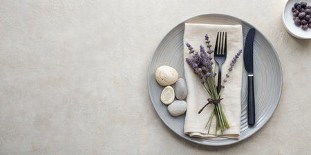 Elegant table setting with lavender flowers and cutlery, top viewの素材