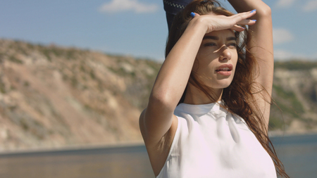 Beautiful young sexy women out at sea on a yachtの写真素材