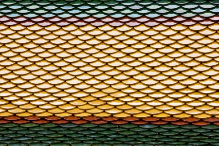 Green, Yellow and Red roof of ancient temple.の写真素材