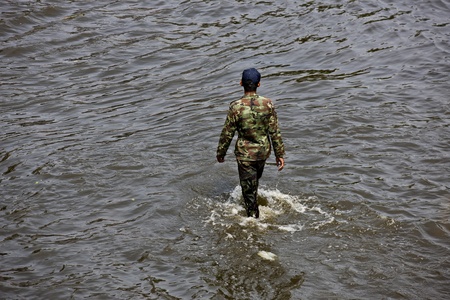 Bangkok, Thailand - November 5, 2011: The Soldier standby to help people during the flooding in Bangkok.のeditorial素材