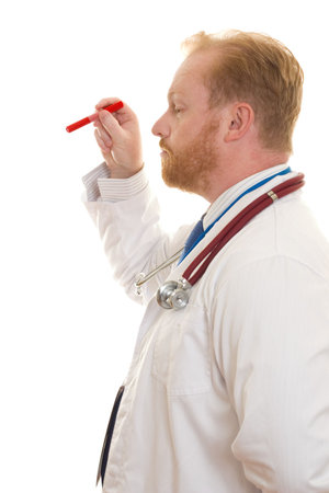 Doctor with an examination lightの写真素材