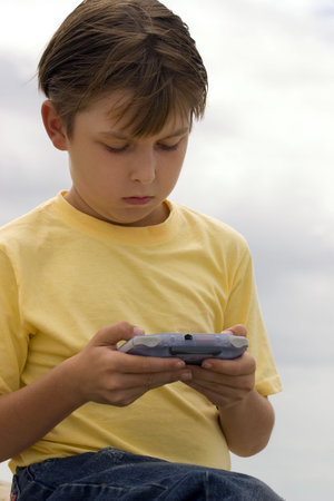 Child playing games on a portable player