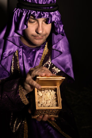 Magi with a  golden box filled with Frankincense.   Frankincense is the hardened resin of the...