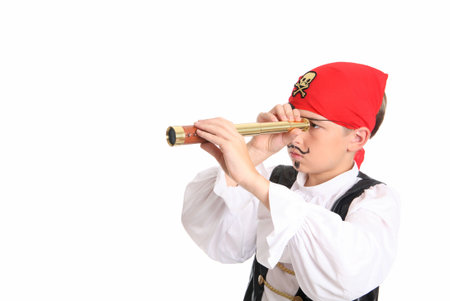 A pirate using a spotting scope to search for ships or far off lands. Horizontal with space for text.の写真素材