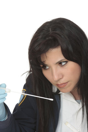 An fbi or detective holds  a forensic swab  specimen.の写真素材
