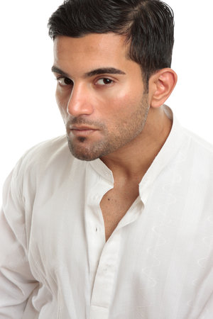 Masculine man profile looking intently or with macho attitude.  White background.の写真素材