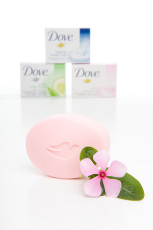 A selection of Dove cream beauty soap bars with a pink soap in the foreground.  White background.  Editorial use only.のeditorial素材