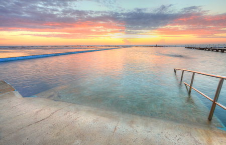 Beautiful morning for a swim.  Sunrise from the Narrabeen Ocean Baths , North Narrabeen NSW...
