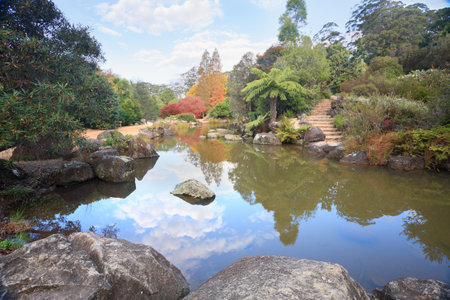 Picturesque lagoon at Mt Tomah in Autumn a beautiful spot in the mountains to relax and unwindの写真素材