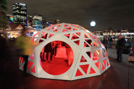 SYDNEY NSW, AUSTRALIA - JUNE 4, 2014;   People interacting and observing the Geodesic Light Dome ...