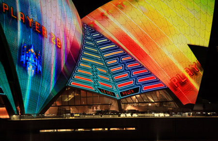 SYDNEY NSW, AUSTRALIA - JUNE 6, 2014; Sydney Opera House roof lit up in bright colours and imagery...