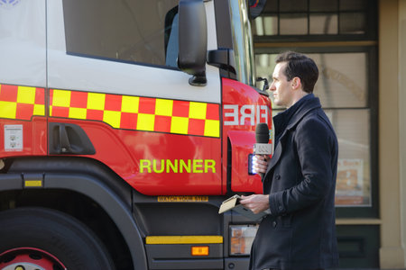 ROZELLE, AUSTRALIA - SEPTEMBER 4, 2014; ABC News Reporter at the scene  of a tragic accident in...