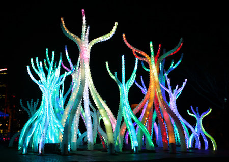SYDNEY, AUSTRALIA - MAY 27, 2015; Looking up at the looming Arclight structures that resemble native mangroves.  Some pieces are large enough to walk between and under and be bathed in their soft light among their twisting stems.のeditorial素材