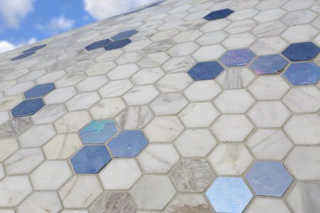 BONDI, AUSTRALIA - OCTOBER 25, 2015;  Annual Sculpture by the Sea free public event.  Exhibit titled Space Time Continuum V4 by Clayton Thompson made of a combination of steel, polystyrene, tileのeditorial素材