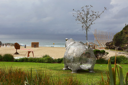 BONDI, AUSTRALIA - OCTOBER 22, 2015;  Annual Sculpture by the Sea free public event.  Exhibit titled Pig of Fortune 2 by Tae Geun Yang.  Stainless steel and granite construction symbol of fortune and fecundityのeditorial素材