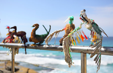 BONDI, AUSTRALIA - OCTOBER 25, 2015;  Annual Sculpture by the Sea free public event.  Exhibit titled Transmigrationby Jeremy Sheehan.  Bird bones made of found ocean plastic and bodies of materials that will breakdown to expose their skeletonのeditorial素材
