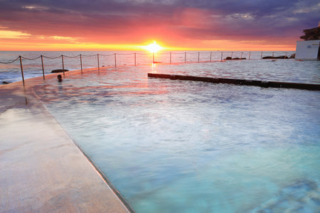Views from the pool edge as the sun rises on another day.  Location, Bronte Baths, Bronte Sydney Australiaのeditorial素材