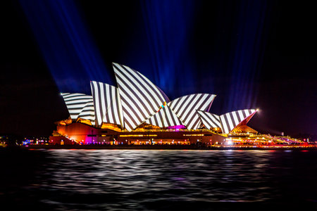 Sydney, Australia - May 25, 2018;  Sydney Opera House lit with vibrant colours geomeric patterns and motion graphics during the Annual Vivid Sydney celebrationsのeditorial素材