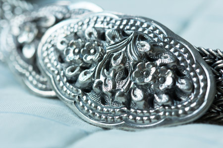 Silver buckle was carved flowers and leaves delicately. This waistband is suitable on casual and ceremonial clothing.の写真素材