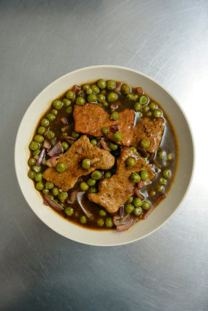 Malaysian Chinese Food Black Pepper Pork Chop with Green Peasの素材