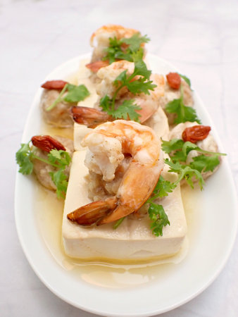Healthy and Nutritious Steamed Tofu with Prawns Shrimps Minced Pork Traditional Chinese Comfort Food Cooking Cuisineの写真素材