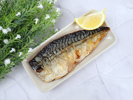 Crispy Skin Grilled Fried Saba Mackerel Fish Fillet Japanese Healthy Food Cuisine Cooking with Lemon