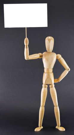 Female mannequin displaying a blank boardの写真素材