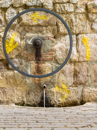 Old water pump in the Road to Santiago, Spainの写真素材