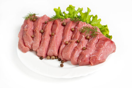 Fresh raw beef on white backgroundの写真素材