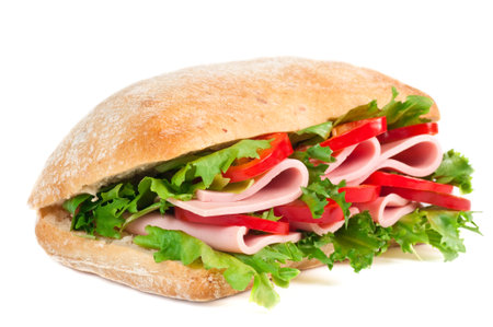 Tomato, salami and pepper panini isolated on whiteの写真素材