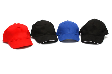 Baseball caps on white backgroundの写真素材
