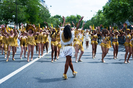 Paris, France - July 6, 2013: Dancers performing on streets of Paris at the annual summer tropical...