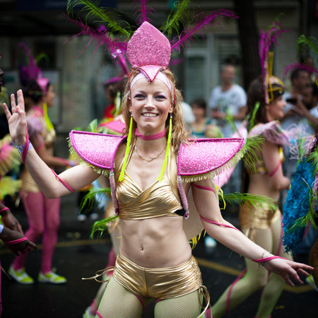 Paris, France - July 7, 2012: Female dancer posing on streets of Paris at the annual summer tropical carnival. This carnival takes place every year in july in Paris 11th district.のeditorial素材