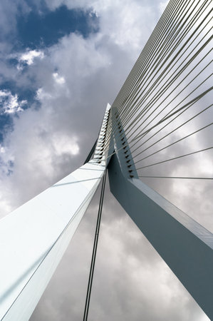 Rotterdam, Netherlands - August 12, 2008: Low angle view of Erasmus bridge  against a cloudy sky.のeditorial素材