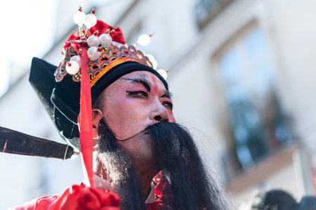 Paris, France - February 02, 2014: Chinese performer in traditional costume at the chinese lunar new year parade.のeditorial素材