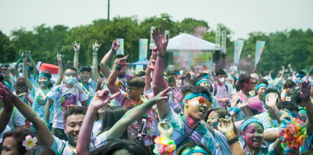 Chengdu, Sichuan province, China - July 2, 2016: Runners having fun at the Color Run China in Chengduのeditorial素材
