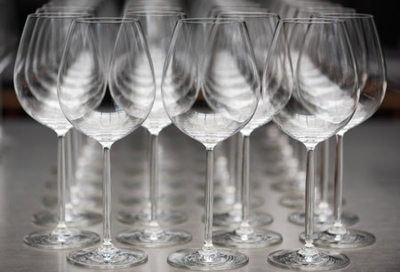 row of empty wine glasses closeup