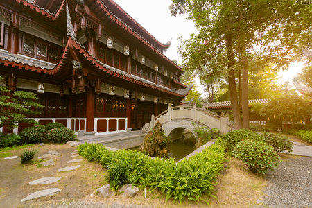 Chengdu, Sichuan Province, China - Dec 1, 2015: Traditional garden and stone bridge in Wenshu monasteryのeditorial素材