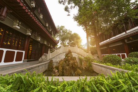 Chengdu, Sichuan Province, China - Dec 1, 2015: Traditional garden and stone bridge in Wenshu monasteryのeditorial素材