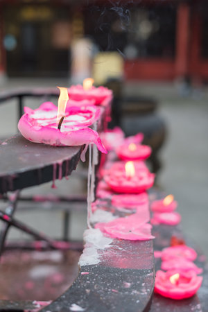 Melted lotus shaped candles in a chinese temple, Chengdu, Chinaの写真素材